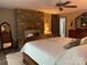 Comfortable main bedroom with stone fireplace at 1115 John Short Rd, Indian Land, SC 29707