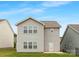 Exterior backyard view of a gray two-story house at 124 Canada Dr # 45, Statesville, NC 28166