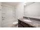 Bathroom featuring a granite countertop vanity with a white basin and a shower-tub combination at 124 Canada Dr # 45, Statesville, NC 28166