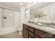 Bathroom features double vanity, granite countertops, and a shower/tub combo at 124 Canada Dr # 45, Statesville, NC 28166