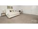 Serene bedroom with a plush bed, neutral decor, and soft carpet flooring at 124 Canada Dr # 45, Statesville, NC 28166