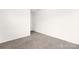 Unfurnished room with neutral carpeting, white walls, and window with blinds at 124 Canada Dr # 45, Statesville, NC 28166