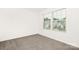 Bright bedroom with neutral carpet, and a window overlooking the neighborhood at 124 Canada Dr # 45, Statesville, NC 28166