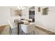 Elegant dining room featuring modern decor, stylish lighting, and a view into the kitchen at 124 Canada Dr # 45, Statesville, NC 28166