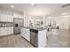 Bright, open kitchen showcasing stainless steel appliances and a convenient breakfast bar area at 124 Canada Dr # 45, Statesville, NC 28166