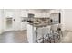 Stylish kitchen featuring white cabinets, stainless steel appliances, and a granite countertop island at 124 Canada Dr # 45, Statesville, NC 28166