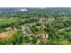 Stunning aerial view of home in a neighborhood with mature trees and landscaping at 133 37Th Avenue Nw Pl, Hickory, NC 28601