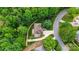 Aerial top-down view of a home with mature trees and lush landscaping at 133 37Th Avenue Nw Pl, Hickory, NC 28601