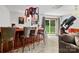 Finished basement with a wet bar, lounge area, and sliding glass door to the outside at 133 37Th Avenue Nw Pl, Hickory, NC 28601