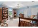 Charming bedroom featuring a vaulted ceiling, built-in bookshelves, and ample natural light, ideal for relaxation at 133 37Th Avenue Nw Pl, Hickory, NC 28601