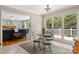 Breakfast nook with breakfast table, outdoor views, and open floorplan to Gathering room at 133 37Th Avenue Nw Pl, Hickory, NC 28601