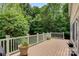 Expansive wooden deck with white railings, perfect for outdoor entertaining and relaxation at 133 37Th Avenue Nw Pl, Hickory, NC 28601