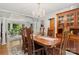 Formal dining room featuring hardwood floors, chandelier, decorative rug, and detailed molding at 133 37Th Avenue Nw Pl, Hickory, NC 28601