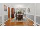 Formal dining room with hardwood floors, wainscoting, and a chandelier at 133 37Th Avenue Nw Pl, Hickory, NC 28601