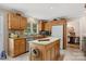 Kitchen with granite countertops, oak cabinets, stainless appliances, and center island at 133 37Th Avenue Nw Pl, Hickory, NC 28601