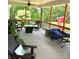 Relaxing patio with outdoor furniture, ceiling fan, and a view of the backyard at 133 Harbourtown Dr, Kings Mountain, NC 28086