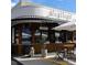 Stylish Milkbread cafe exterior with a classic awning and inviting outdoor seating at 1729 Kensington Dr, Charlotte, NC 28205