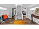 Upstairs hallway with open doorways leading to bedrooms, bathroom and stairway at 1729 Kensington Dr, Charlotte, NC 28205