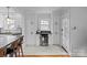 Well-lit kitchen with white cabinets, wine fridge, and easy access to the back door at 1729 Kensington Dr, Charlotte, NC 28205