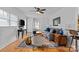 Inviting living room with a ceiling fan, built-ins, and a traditional rug at 1729 Kensington Dr, Charlotte, NC 28205