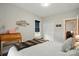 Bedroom featuring soft lighting, wooden accents, a desk, and access to a cozy seating area at 204 Craig St, Mount Holly, NC 28120