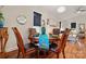 Elegant dining room with a round table, carved wood chairs, and decorative elements at 204 Craig St, Mount Holly, NC 28120