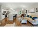Open-concept living space with modern kitchen, cozy seating, and elegant decor, designed for comfortable living at 204 Craig St, Mount Holly, NC 28120