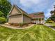 A well manicured yard, complete with a patio area that overlooks the property at 204 W Boyd St, Maiden, NC 28650
