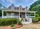 Charming home with a inviting front porch, well-kept landscaping, and a stone walkway at 204 W Boyd St, Maiden, NC 28650