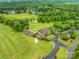 Aerial view of the golf course and country club amenities featuring lush green fairways and clubhouse at 2289 Pine Valley Dr, Denver, NC 28037