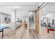 Spacious basement featuring a stone fireplace, gym, rec space, and a bar area at 2289 Pine Valley Dr, Denver, NC 28037
