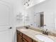 Bathroom featuring a double vanity with granite countertop and framed mirrors at 2289 Pine Valley Dr, Denver, NC 28037