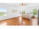 Bright bedroom with hardwood floors and a wall design at 2289 Pine Valley Dr, Denver, NC 28037