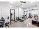 Home gym equipped with weightlifting equipment and ample workout space at 2289 Pine Valley Dr, Denver, NC 28037