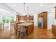 Well-appointed kitchen features granite countertops, wood cabinetry, and stainless steel appliances at 2289 Pine Valley Dr, Denver, NC 28037