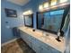 Bathroom features double sink vanity, two mirrors and a shower with glass doors at 2310 Gill Jordan Rd, Chester, SC 29706