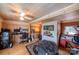 Cozy bedroom with hardwood floors, a ceiling fan, and natural light at 2310 Gill Jordan Rd, Chester, SC 29706