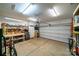 Spacious garage with concrete floor, tool bench, and shelving at 2310 Gill Jordan Rd, Chester, SC 29706