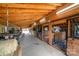 Spacious horse barn with wood ceiling, stalls, and a concrete floor at 2310 Gill Jordan Rd, Chester, SC 29706