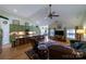 Open living area featuring vaulted ceiling, hardwood floors, and updated kitchen at 2310 Gill Jordan Rd, Chester, SC 29706