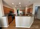 Bright kitchen with stainless steel appliances, plenty of cabinets, and modern lighting at 2567 Holly Oak Ln, Gastonia, NC 28056