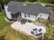 A beautiful backyard with a concrete patio, outdoor seating, hot tub, and built-in grill perfect for entertaining at 2577 Bonnybrook Cir, Rock Hill, SC 29732
