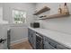 Butler's pantry with gray cabinets, open shelving, and a wine refrigerator at 2577 Bonnybrook Cir, Rock Hill, SC 29732