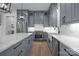 Stylish kitchen showcasing shaker cabinets, quartz countertops, stainless steel appliances, and a trendy black faucet at 2577 Bonnybrook Cir, Rock Hill, SC 29732