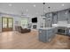 Open floor plan featuring kitchen, living and dining, seamlessly connected for easy entertaining, and a cozy atmosphere at 2577 Bonnybrook Cir, Rock Hill, SC 29732