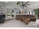 Inviting porch view featuring fireplace, TV, comfortable seating, and natural light at 2577 Bonnybrook Cir, Rock Hill, SC 29732