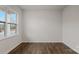 Well-lit room with beautiful wood floors and a large window at 2617 Goose Fair Rd # 59, Maiden, NC 28650
