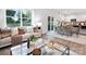 Bright, open-concept living room with a view of the outdoors and combined dining area at 2617 Goose Fair Rd, Maiden, NC 28650