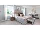 A bright main bedroom featuring large windows, neutral decor, and comfortable seating at 2617 Goose Fair Rd, Maiden, NC 28650