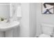 Clean and minimalist powder room with a pedestal sink and modern decor at 2617 Goose Fair Rd, Maiden, NC 28650